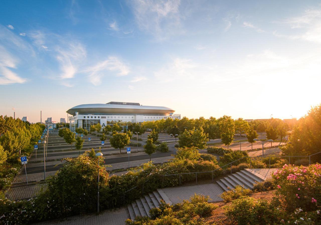 Hostel Mannheim Exterior photo The stadium at sunset